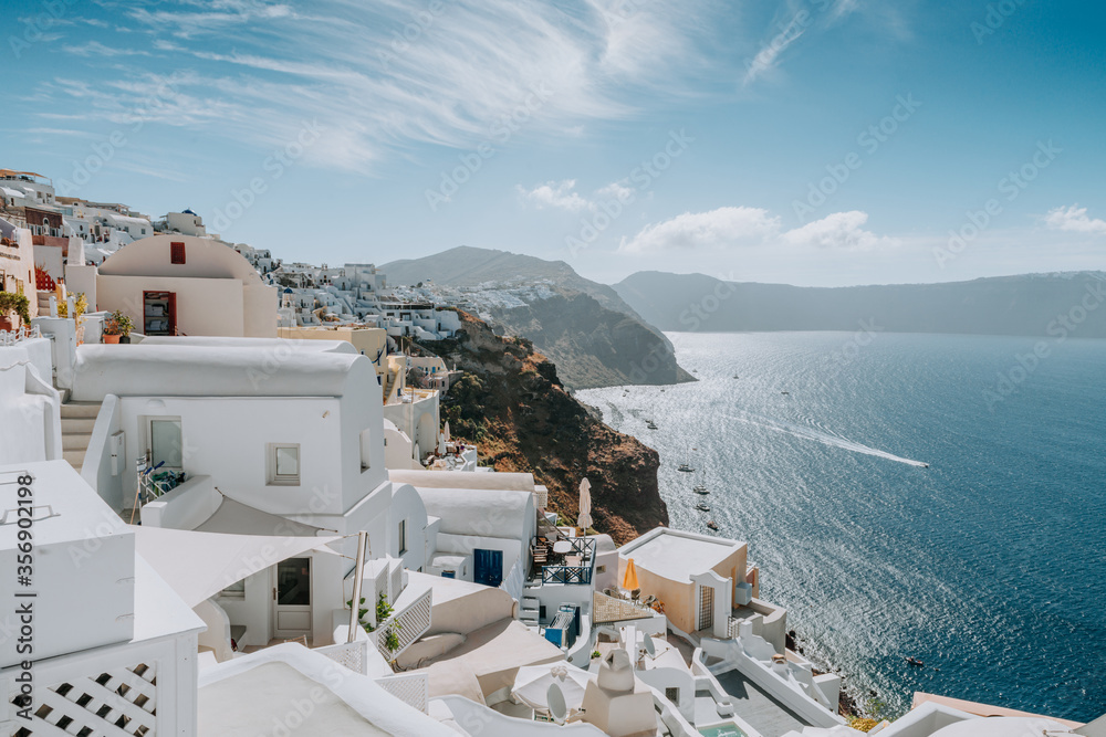 Obraz premium Oia Santorini Greece famous with romantic and beautiful sunsets. Oia village in Santorini island.Greece.