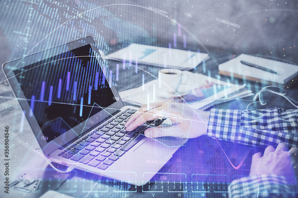 Double exposure of forex chart with man working on computer on background. Concept of market analysis. Double exposure of forex chart with man working on computer on background. Concept of market analysis.