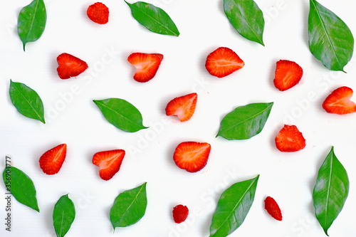 set of red strawberry and green leaves on white background 