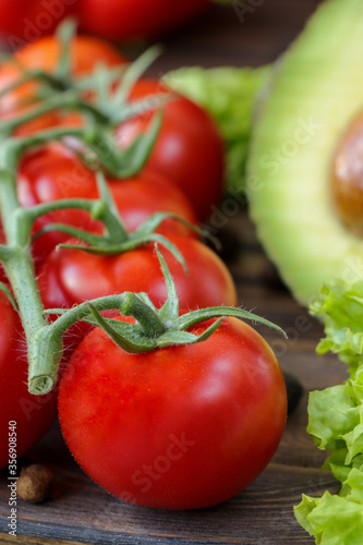 fresh tomatoes on the background of vegetables