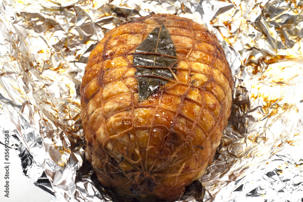 Fototapeta premium roasted meat with baked bay leaf
