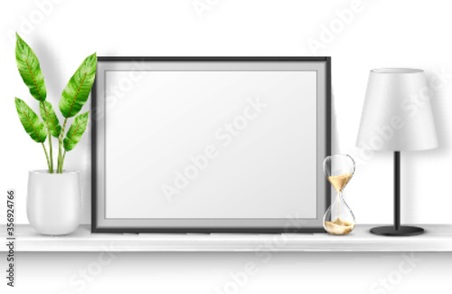 Empty photo frame stand on white shelf with potted plant, hourglass and table lamp, home interior decor with blank place for picture and black border. Realistic 3d vector bookshelf with accessories