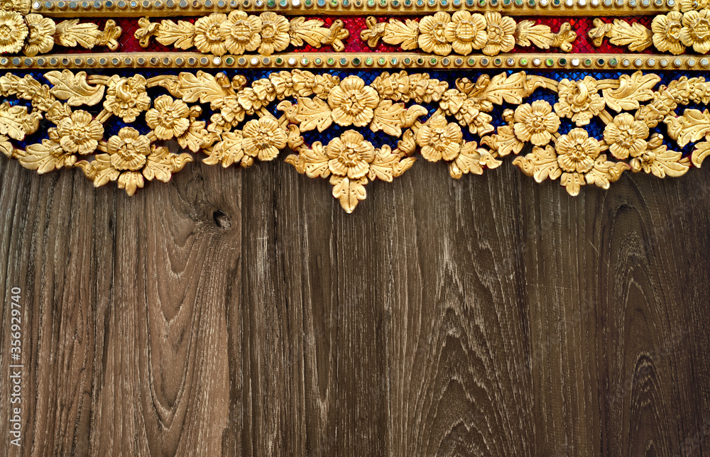 Tradition Thai frame with wooden background Tradition Thai frame with wooden background