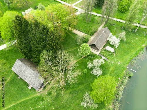 Forest and river aerial view from a drone. Summer landscape. Background. 