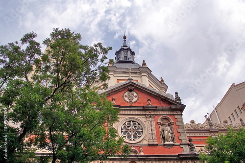 Calatravas baroque historic church facade in Madrid city center. Spain photo