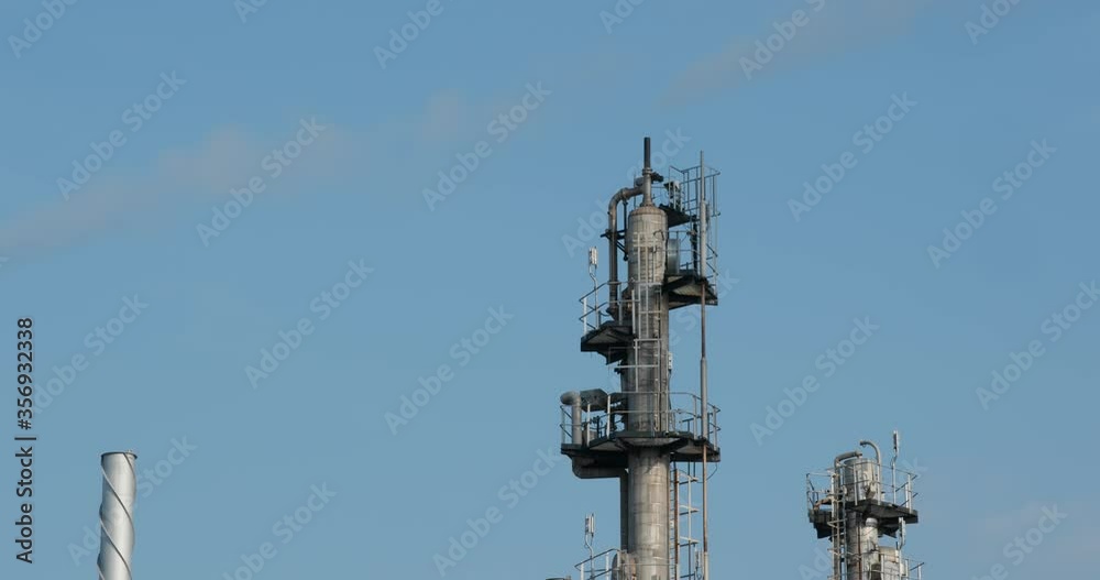 Industrial factory plant over blue sky