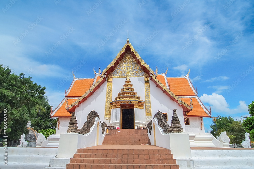 view of Buddhist Temple with blue sky background, Wat Phumin, Nan Province, northern of Thailand.