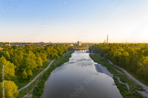 Drone image of Isar river flowing in the direction of Munich city centre in Bavaria, germany photo