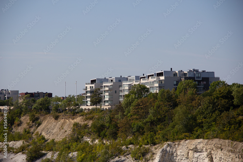 Some contemporary buildings built on the edge of an old limestone quarry in Malmö, Sweden Some contemporary buildings built on the edge of an old limestone quarry in Malmö, Sweden
