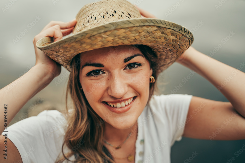 Young girl with cowboy hat.