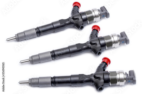 фотографія three New injector for the diesel engine on a white background