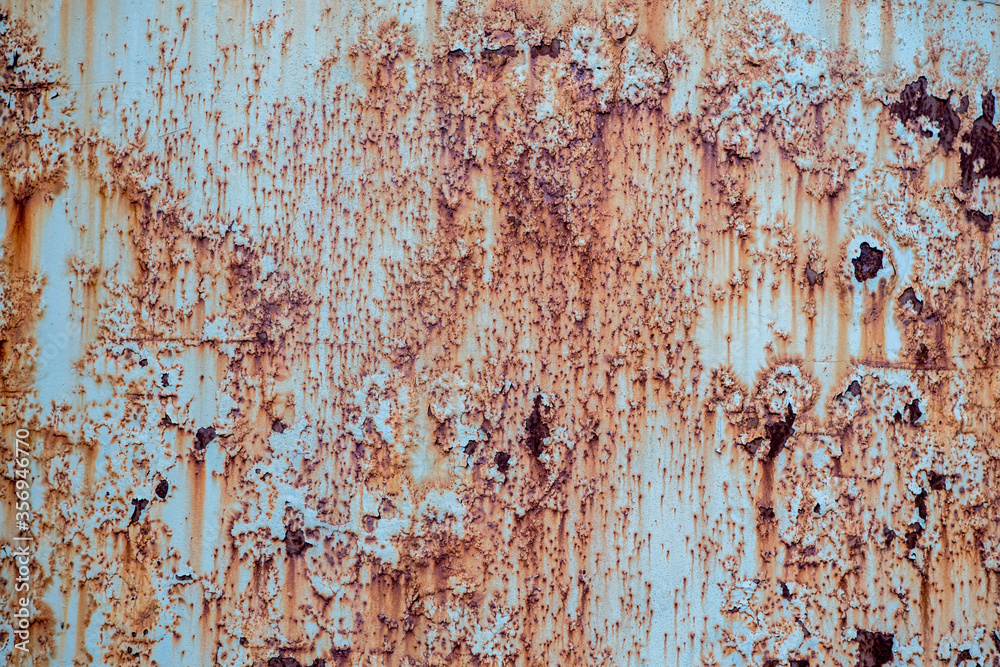 background and texture of old metal surface is covered with blue paint and rust background and texture of old metal surface is covered with blue paint and rust