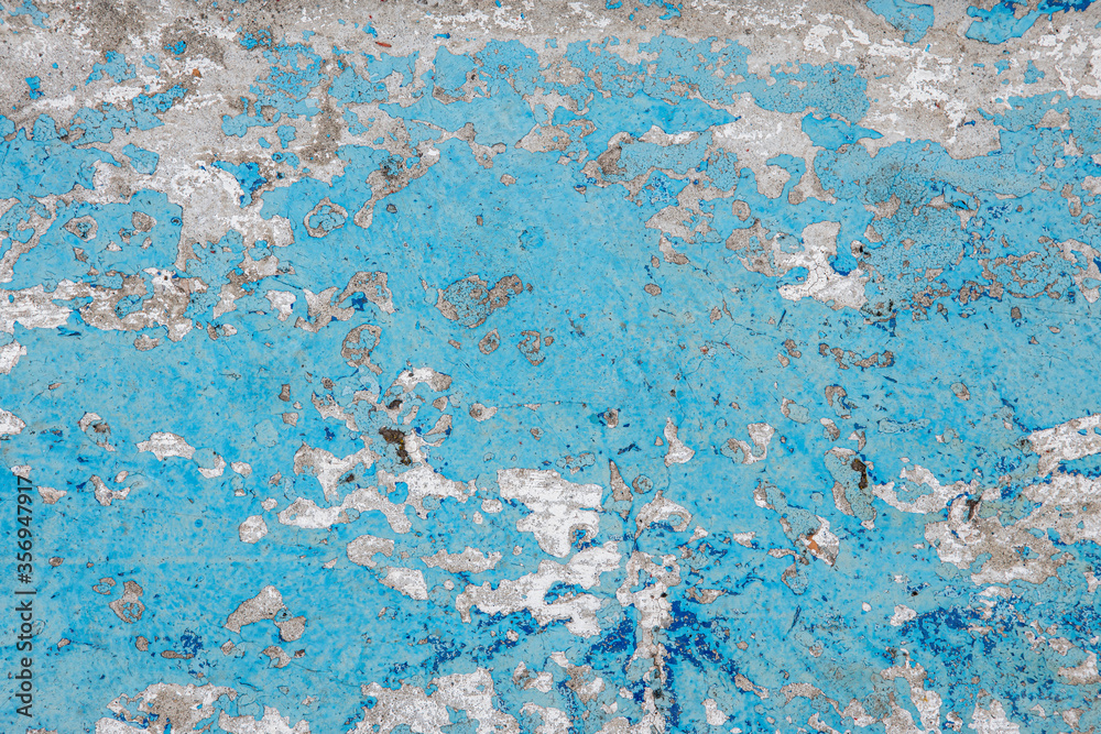 background and texture of old concrete wall with cracked paint on it background and texture of old concrete wall with cracked paint on it