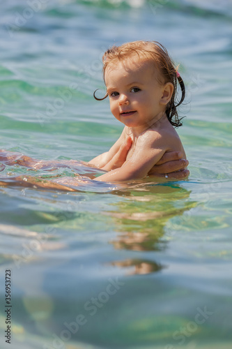 child in the sea
