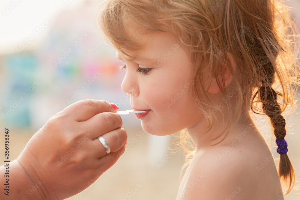 little girl eating ice cream