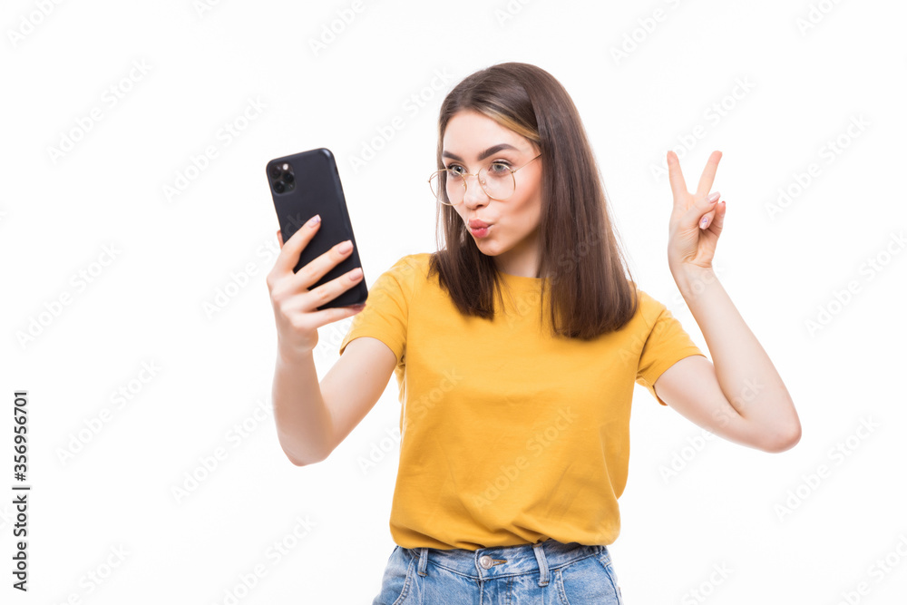 Education, technology and internet - young woman browsing in smartphone or have video call isolated on white background Education, technology and internet - young woman browsing in smartphone or have video call isolated on white background