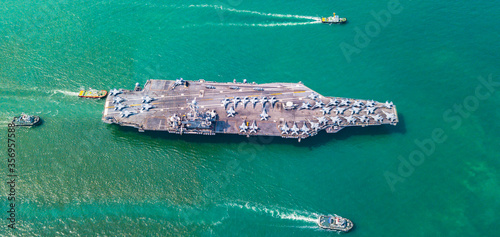 US  Aircraft Carrier Nuclear ship, Military navy ship carrier full loading fighter jet aircraft for prepare troops, The USS Ronald Reagan  photo