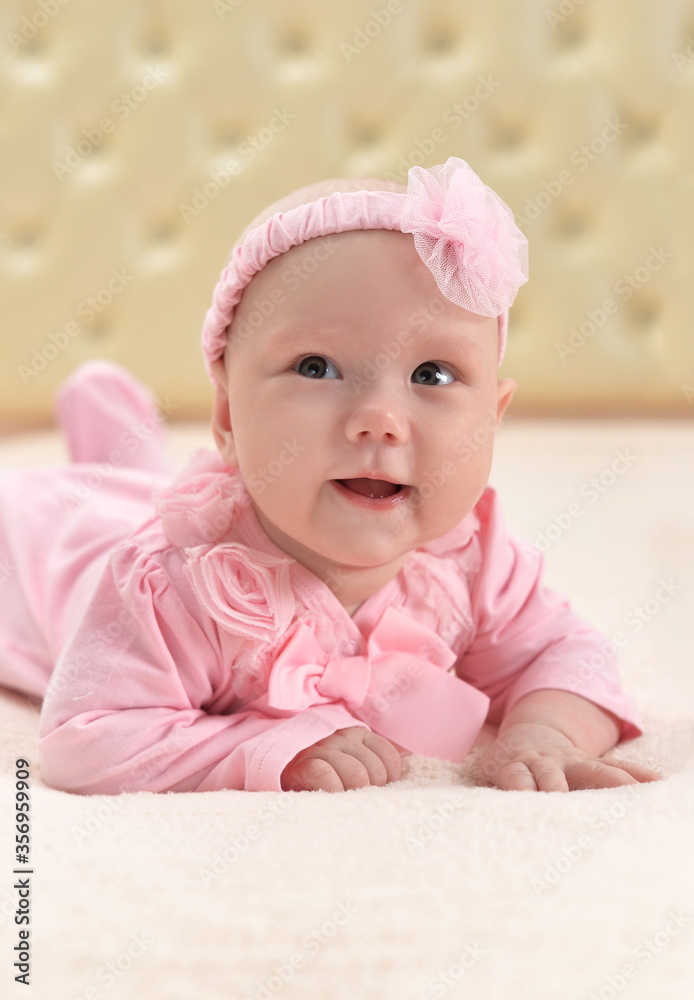 Portrait of cute little baby girl on bed Portrait of cute little baby girl on bed