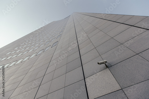 Skyscraper with surveillance camera