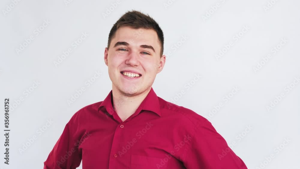 Cheerful man portrait. Admiration support. Confident guy greeting gesture isolated on light background. Cheerful man portrait. Admiration support. Confident guy greeting gesture isolated on light background.