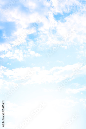 Vertical image white cloud with a blue sky background. blue sky wallpaper