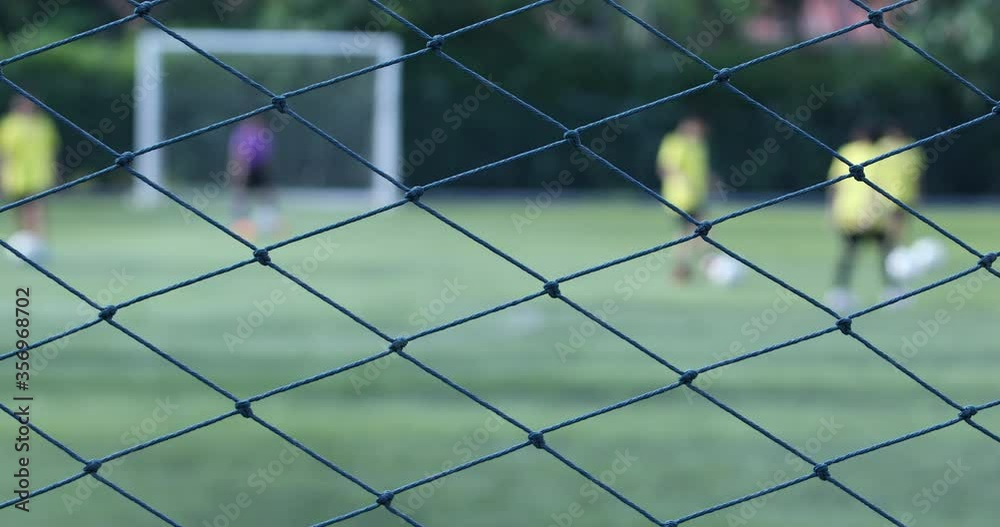 goal net soccer in the sunset,Sunset with football net background, goal net soccer in the sunset,Sunset with football net background,