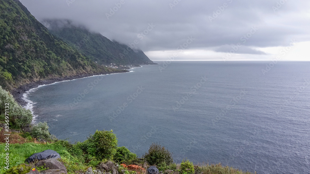 Landscape of coastal trail at the island of Sao Jorge, Azores, Portugal