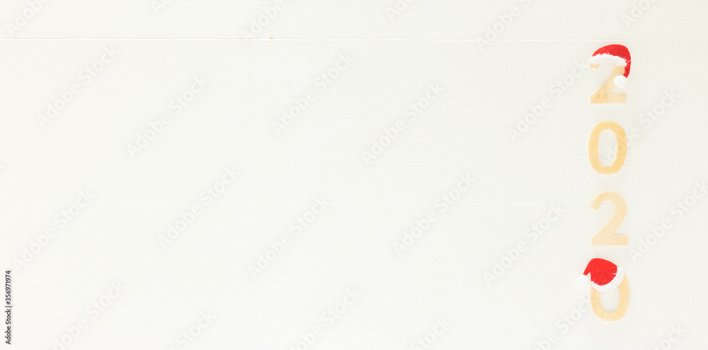 Fototapeta premium White Decorative 2020 Wooden Horizontal Background with Copy Space for Message, Banner. Top View, Flat Lay Composition. Concept: Marry Christmas and Happy New Year. 