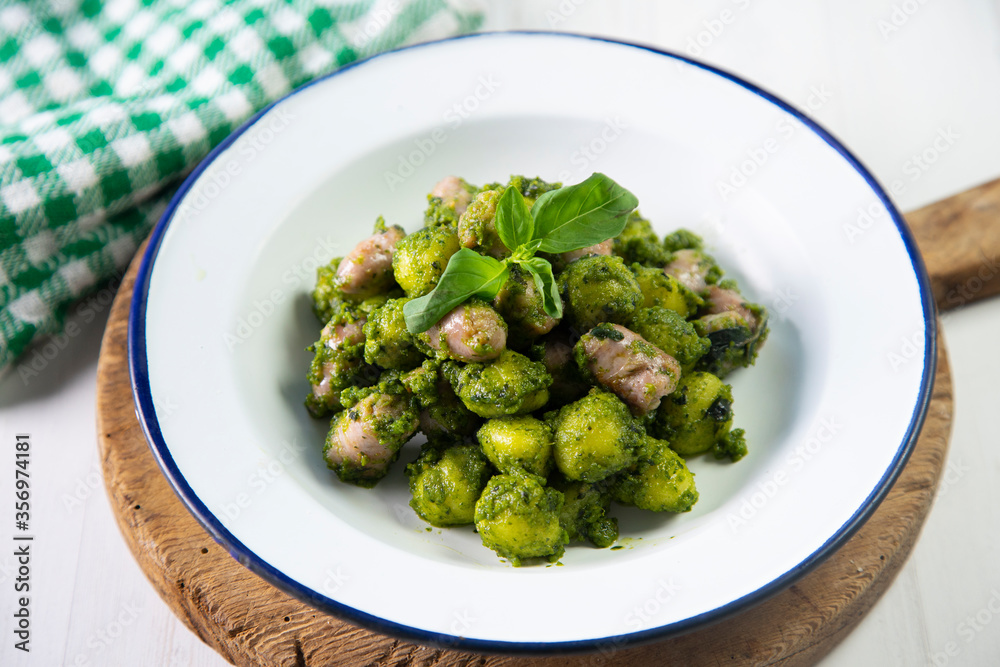 Gnocchis with pesto and salchicha Gnocchis with pesto and salchicha