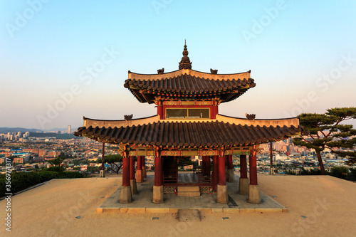 Hwaseong Fortress (Seojangdae) or Suwon Hwaseong is a fortification surrounding the centre of Suwon on sunset, Suwon, South Korea © Victoria