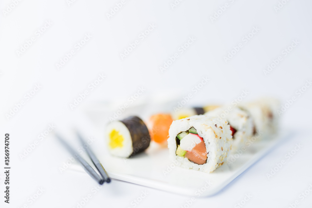 Close up of japanese sushi set on white background. Close up of japanese sushi set on white background.