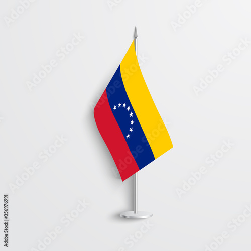 Venezuela table flag on grey background. Venezuela desk flag decoration isolated on light grey background.