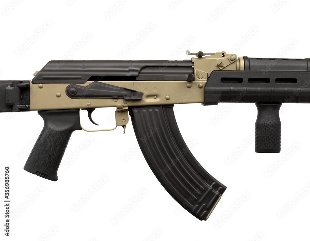 Classic AK automatic carbine in a modern body kit. Soviet army weapons isolate on a white back. Classic AK automatic carbine in a modern body kit. Soviet army weapons isolate on a white back.