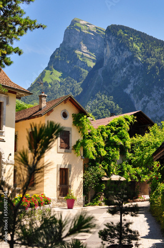 A view of le Criou mountain with the picturesque village of Samoens in the French Alps in the foreground. photo