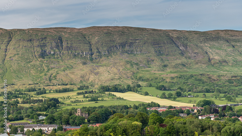 The village of Lennoxtown sitting below the Campsie Fells in Scotland