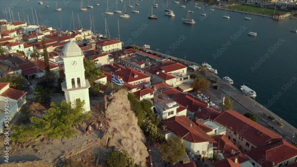 Drone bid’s eye view of Poros island. Famous clock tower and greek ...