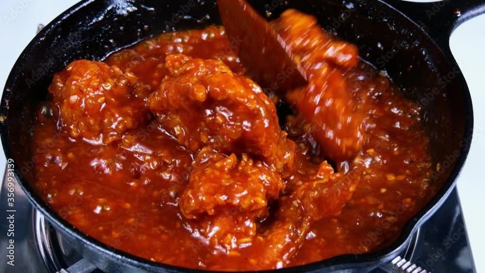 Korean food : Yangnyeom Chicken(Korean fried chicken). Yangnyeom Chicken is mixed with fried chicken made with red pepper paste, tomato sauce, garlic, starch syrup, etc.