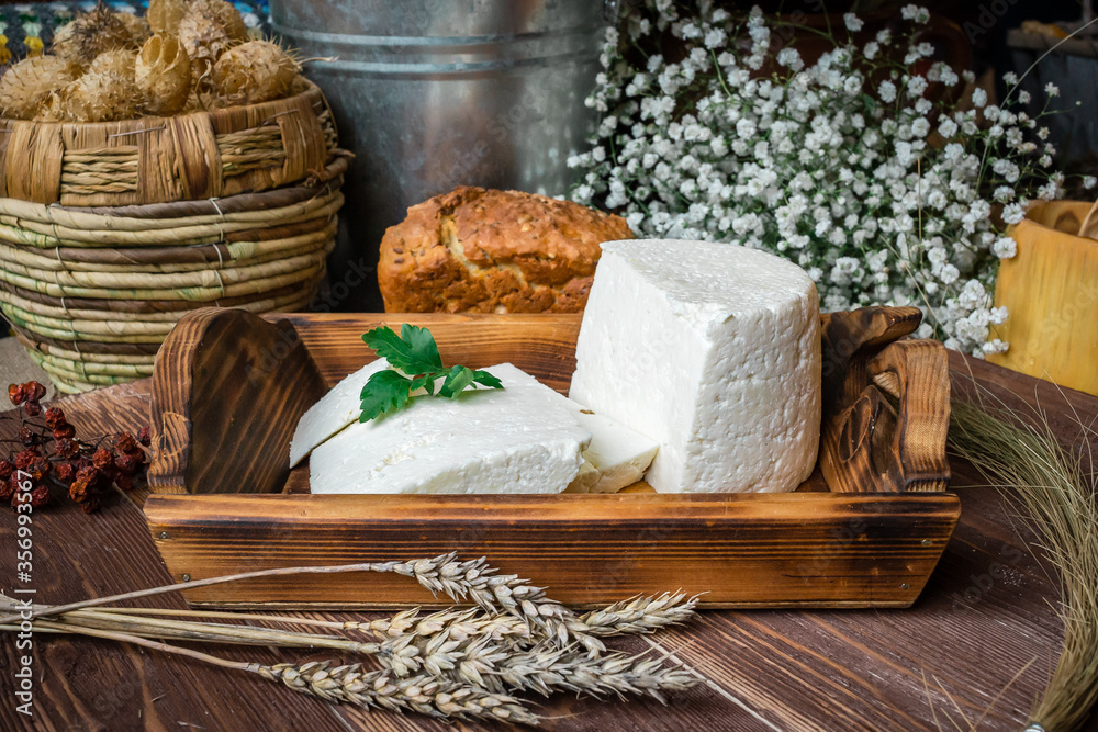 Beautiful homemade circassian cheese with parsley Beautiful homemade circassian cheese with parsley
