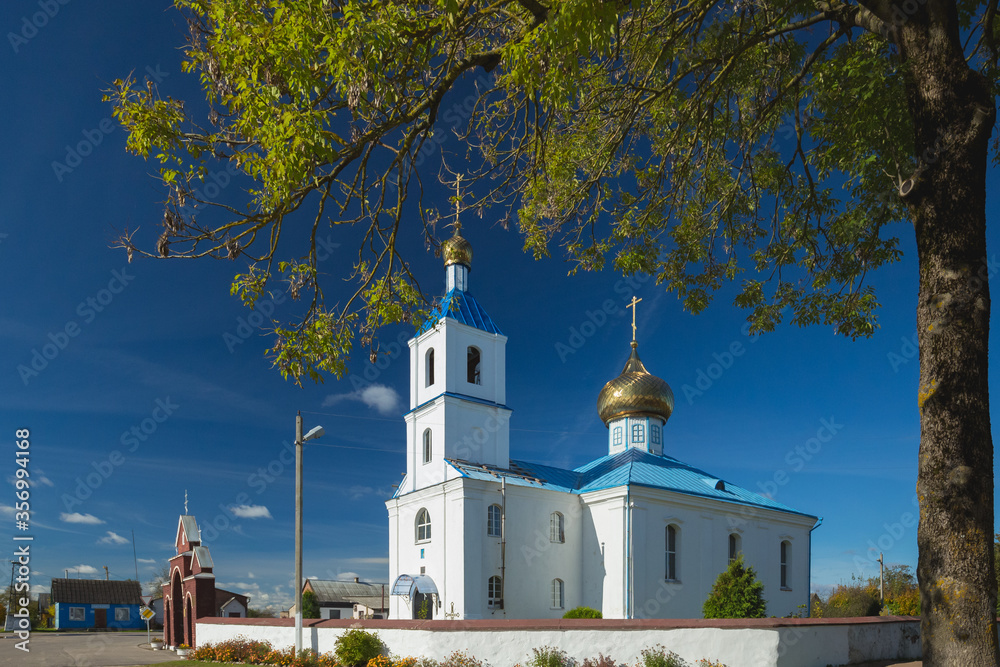 Luzhki, Vitebsk Region, Belarus. Orthodox Church Of Nativity Of Virgin In Sunny Day
