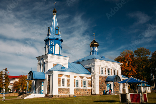 Dokshitsy, Vitebsk Region, Belarus. Holy Intercession Church In Sunny Autumn Day photo