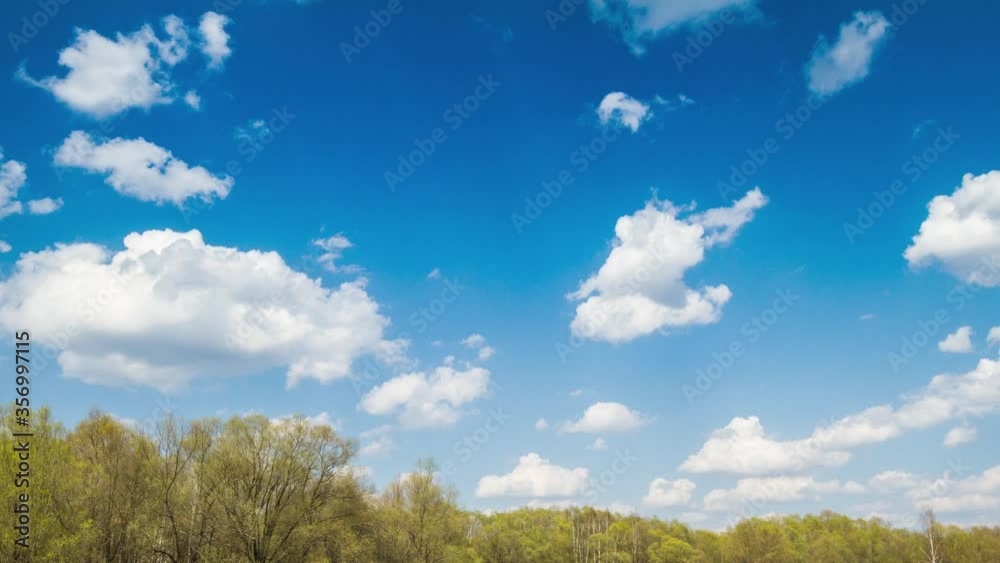 Beautiful blue sky with clouds background 4K. Sky clouds and forest. Weather nature cloud blue. Beautiful blue sky with clouds background 4K. Sky clouds and forest. Weather nature cloud blue.