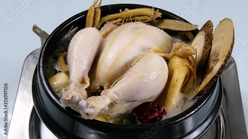 Korean food : Samgyetang(Ginseng Chicken Soup).  Samgyetang is a summer health food that is boiled with various medicinal herbs such as ginseng, jujube, glutinous rice, garlic, and chicken.