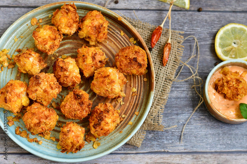  Home made Crispy Chicken   Popcorn with honey mustard sauce on wooden background