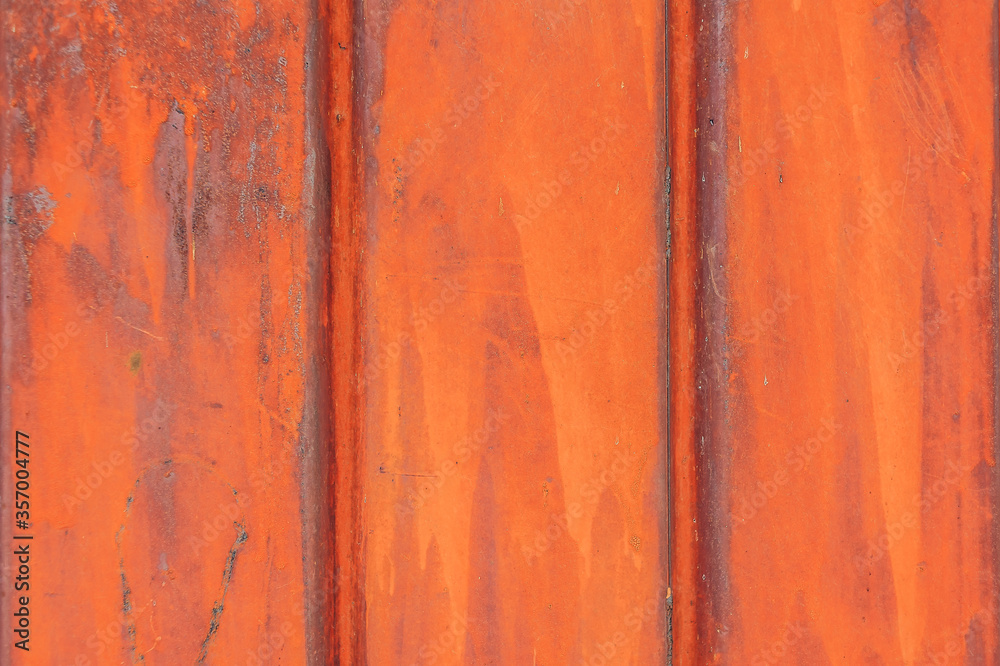 Vintage old red metal wall background. Material, retro.