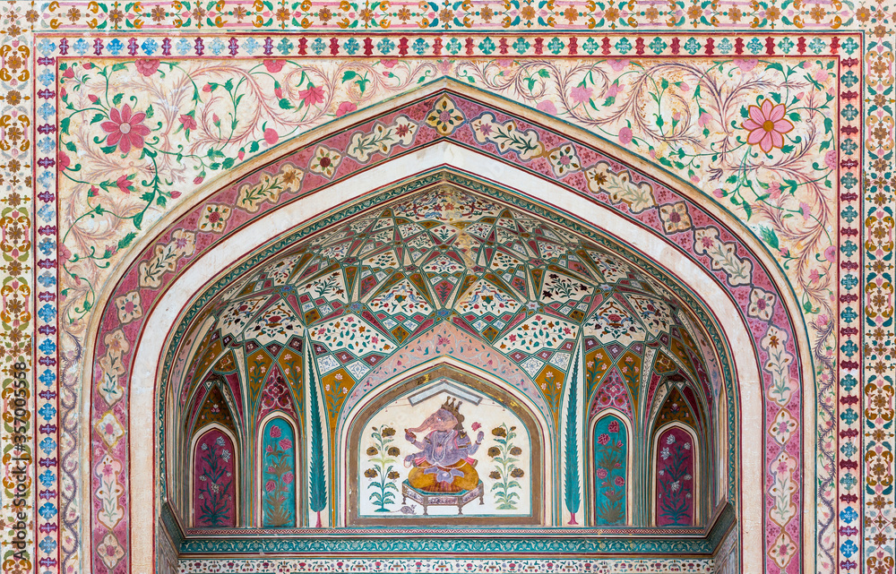 A mural of the Hindu god Ganesh at the Ganesh Pol (Ganesha Gate) at the Amber Palace in Rajasthan, India