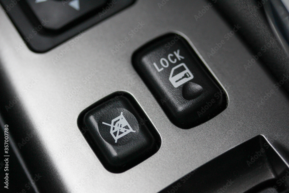 Vehicle window and door lock buttons Vehicle window and door lock buttons