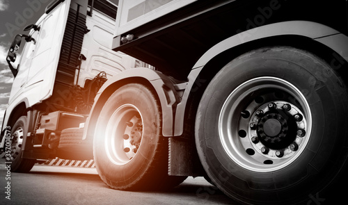 Fotografía Truck on parking, Closeup a truck wheels of semi truck