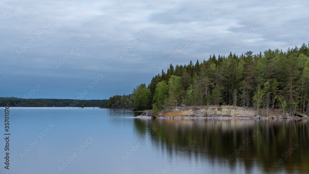 Summer twilight on island Haukkasalo on lake Päijänne in Finland