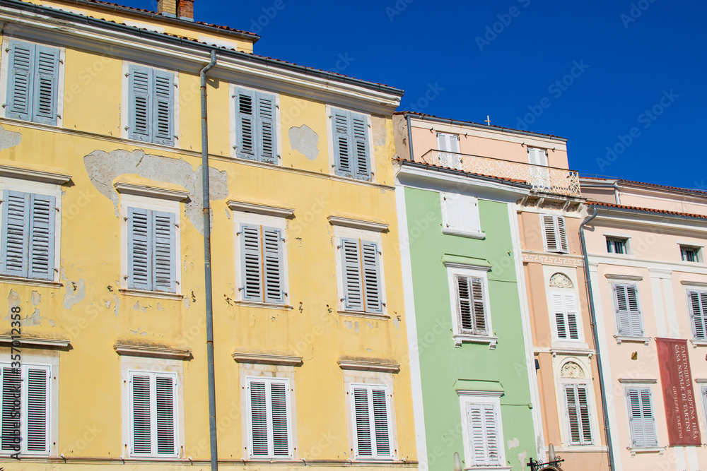 View of traditional colorful slovenian buildings in Tartini Square, in the old town of Piran, in Slovenia