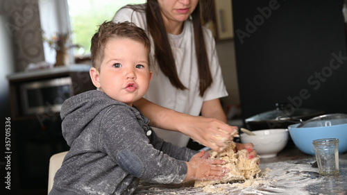 mother and child make dough